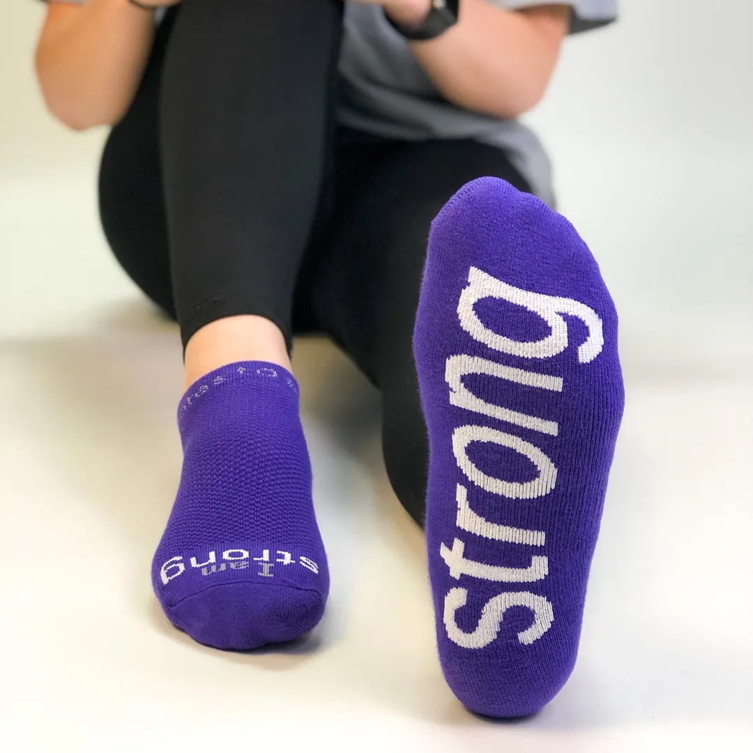 I am strong™ purple low-cut socks with white words